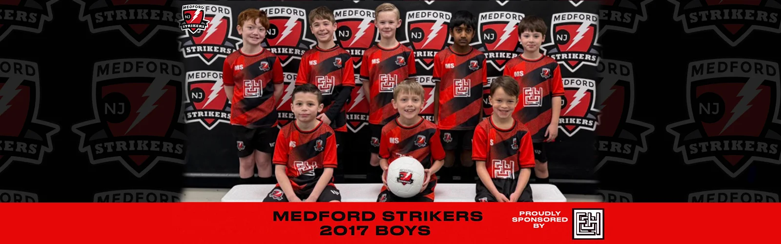 Youth soccer team photo in red uniforms